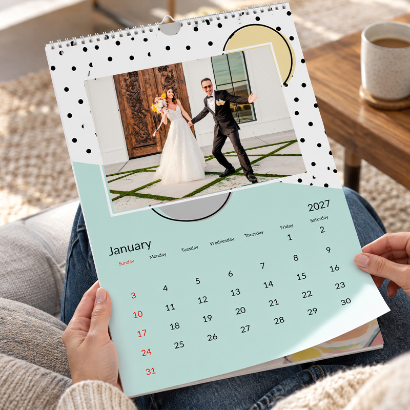A3 personalised wall calendar being held and viewed